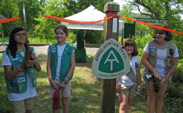 Pawling Girl Scouts cut the ribbon, opening the new A.T. boardwalk.